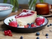 closeup-shot-cheesecake-with-jelly-decorated-with-strawberries-berries